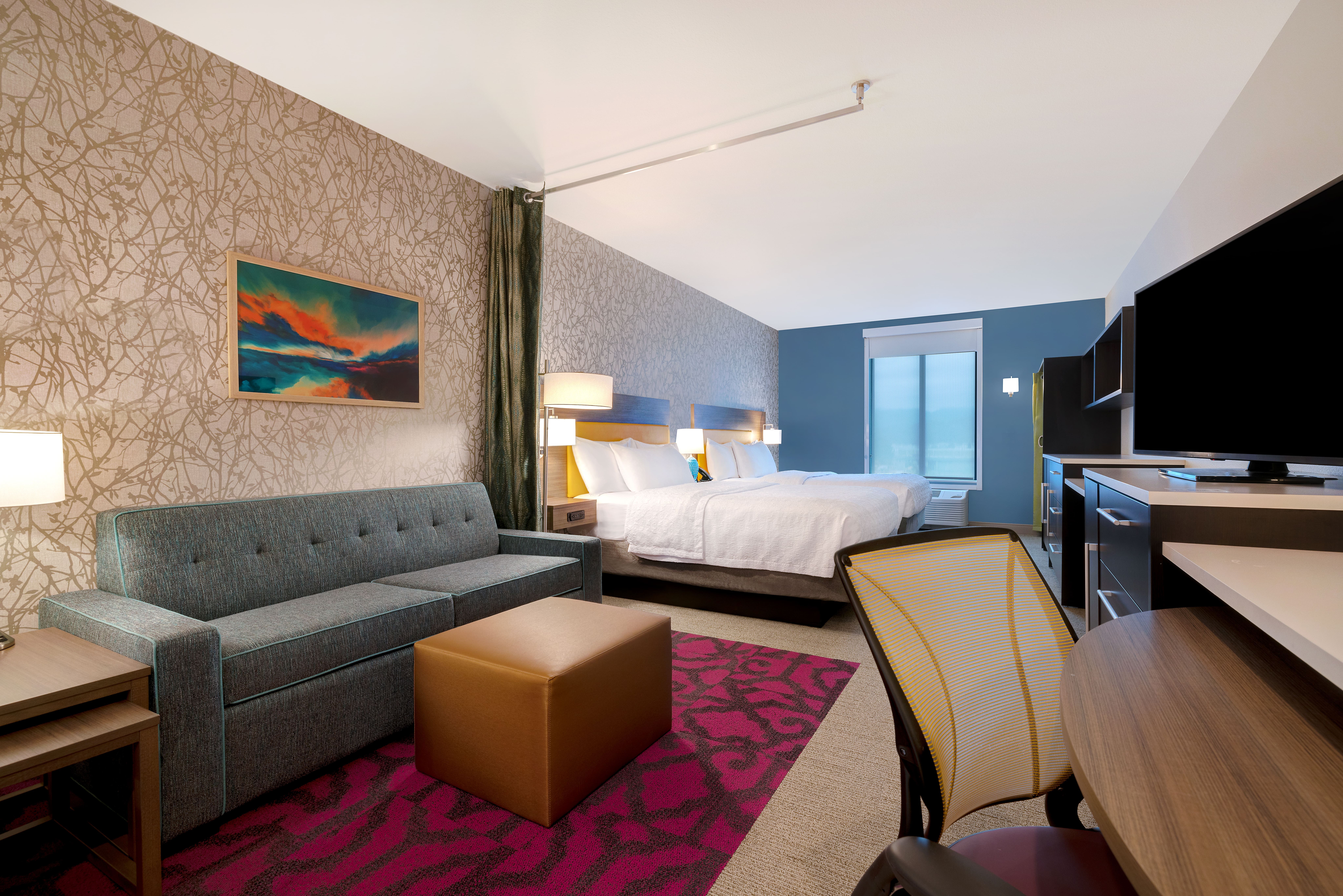 Interior view of a hotel room at Home2 Suites by Hilton in Redding.