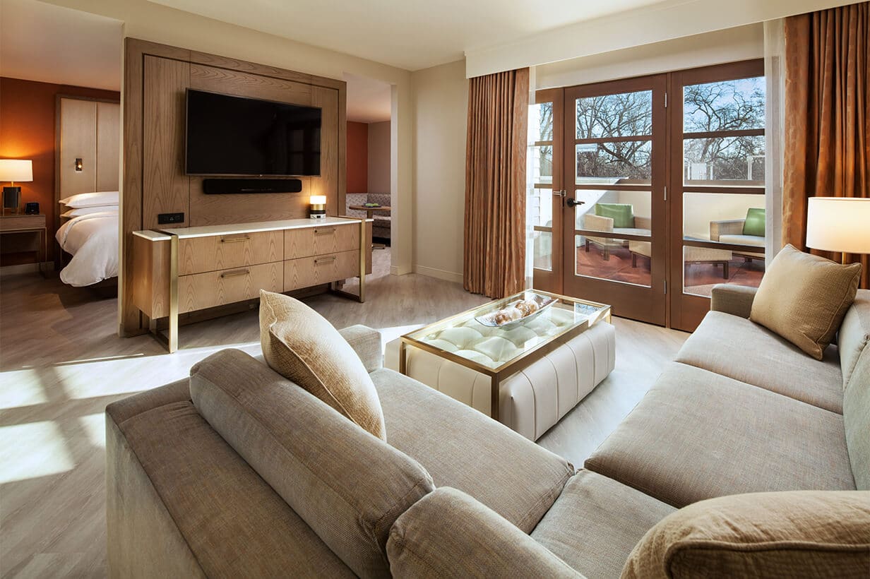 An interior of a king executive suite in the Sheraton Redding